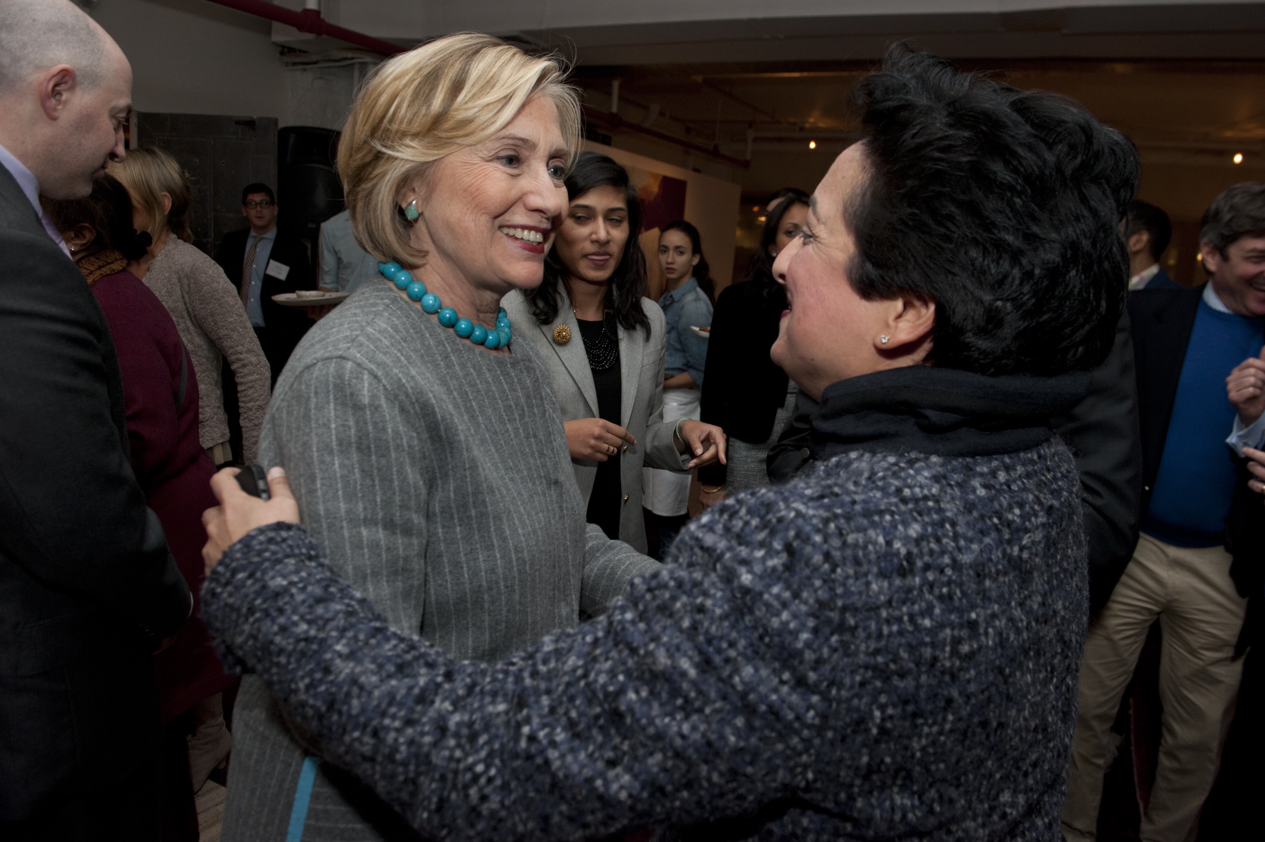 Shamina Singh greets former presidential candidate Hilary Clinton.