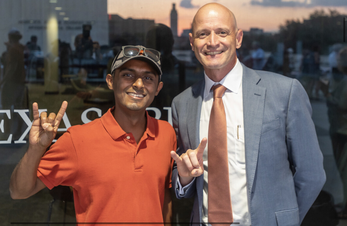 Vivek Shastry and LBJ School Dean JR DeShazo mark the start of the school year at the school’s annual Welcome Back Party on the Plaza.