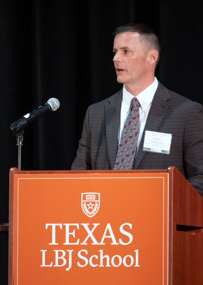 Marty Luby at an LBJ podium