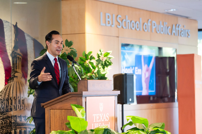 Julian Castro speaks at podium at LBJ School 