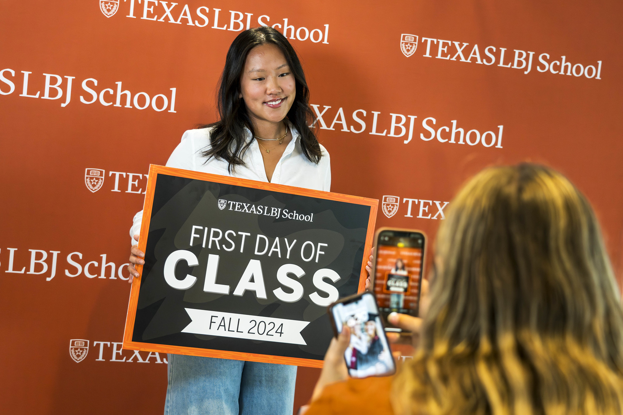 student posing on first day of class