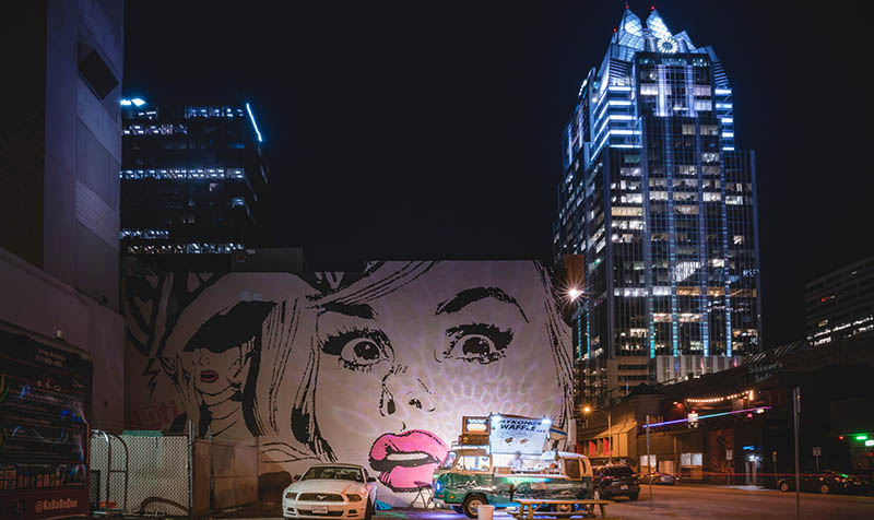 Mural in downtown Austin at night. Credit: Cosmic Timetraveler, Unsplash