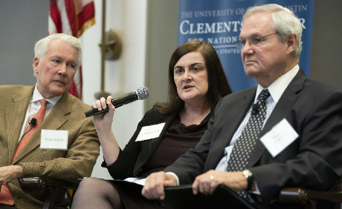 Philip Bobbitt, Amy McAuliffe and LBJ's Robert Hutchings during the symposium.