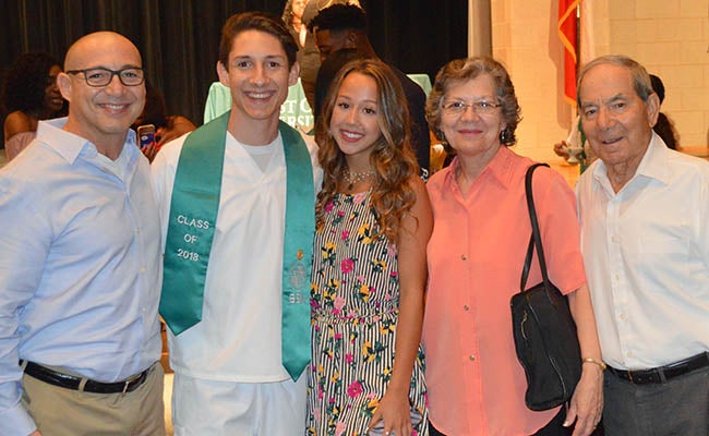 DaSilva with his dad, sister and grandparents at his 2018 graduation from West Coast University