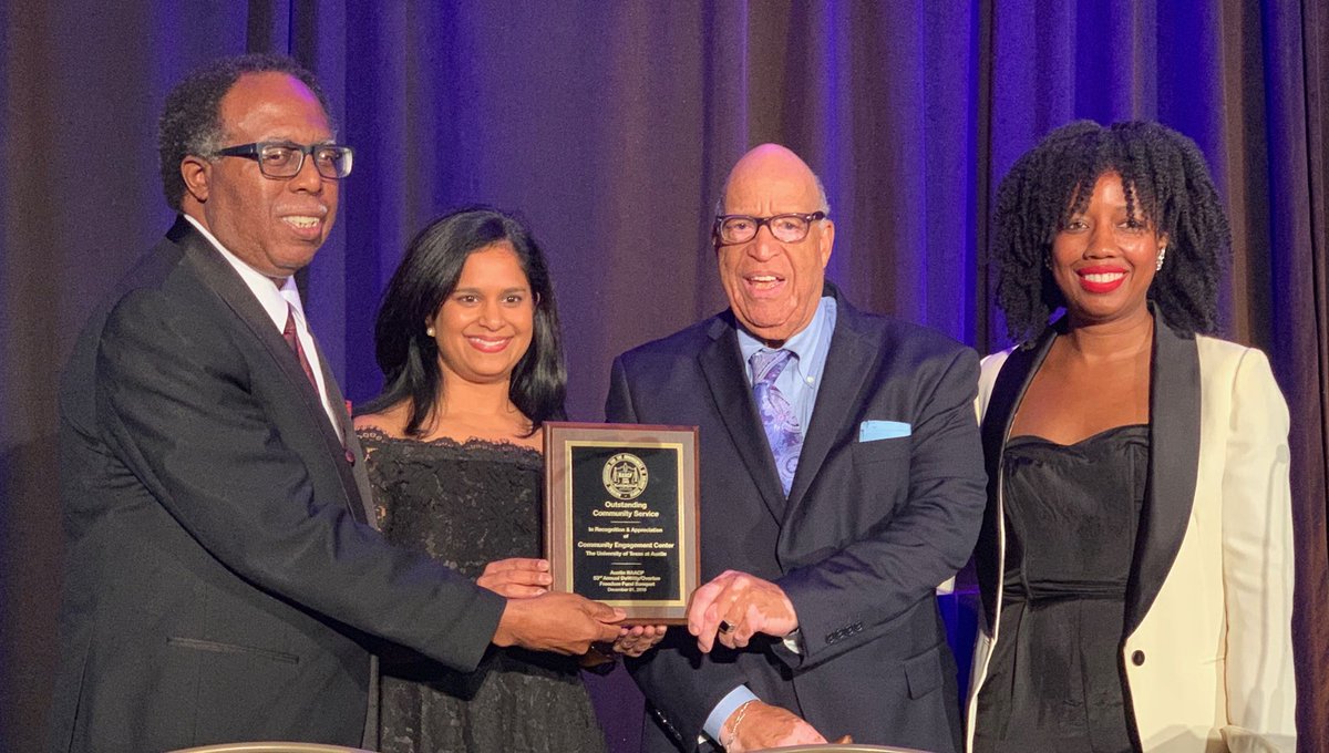 Virginia A. Cumberbatch (MPAff '16) and the rest of the team at the UT Austin DDCE Center for Community Engagement accepts an award from the NAACP