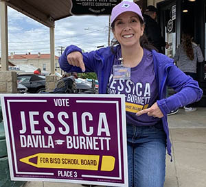 LBJ Women's Campaign School alumna Jessica Davila with one of her campaign signs
