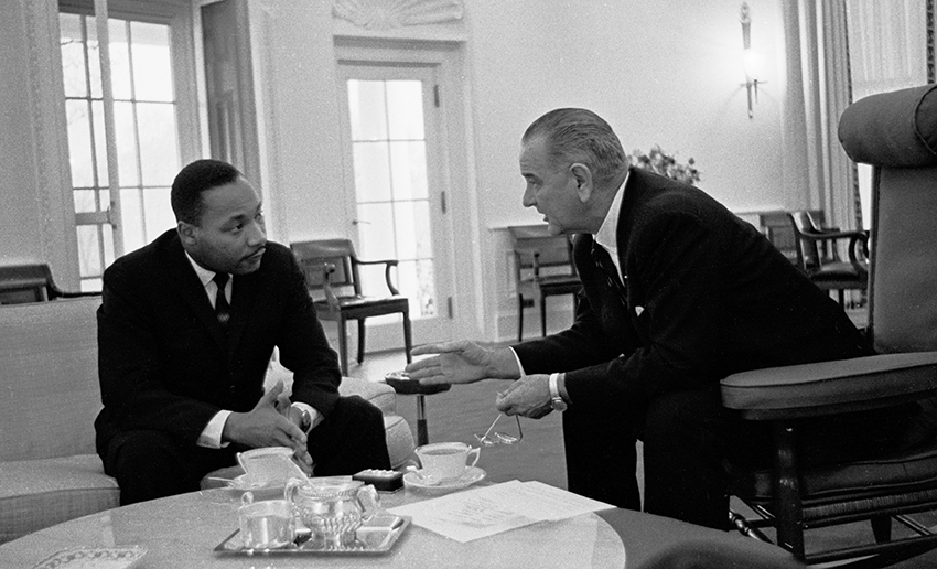 Dr. Martin Luther King Jr. talks with President Lyndon B. Johnson in the Oval Office on Dec. 3, 1963