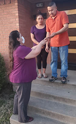 LBJ Women's Campaign School alumna Monica Alonzo campaigning door to door