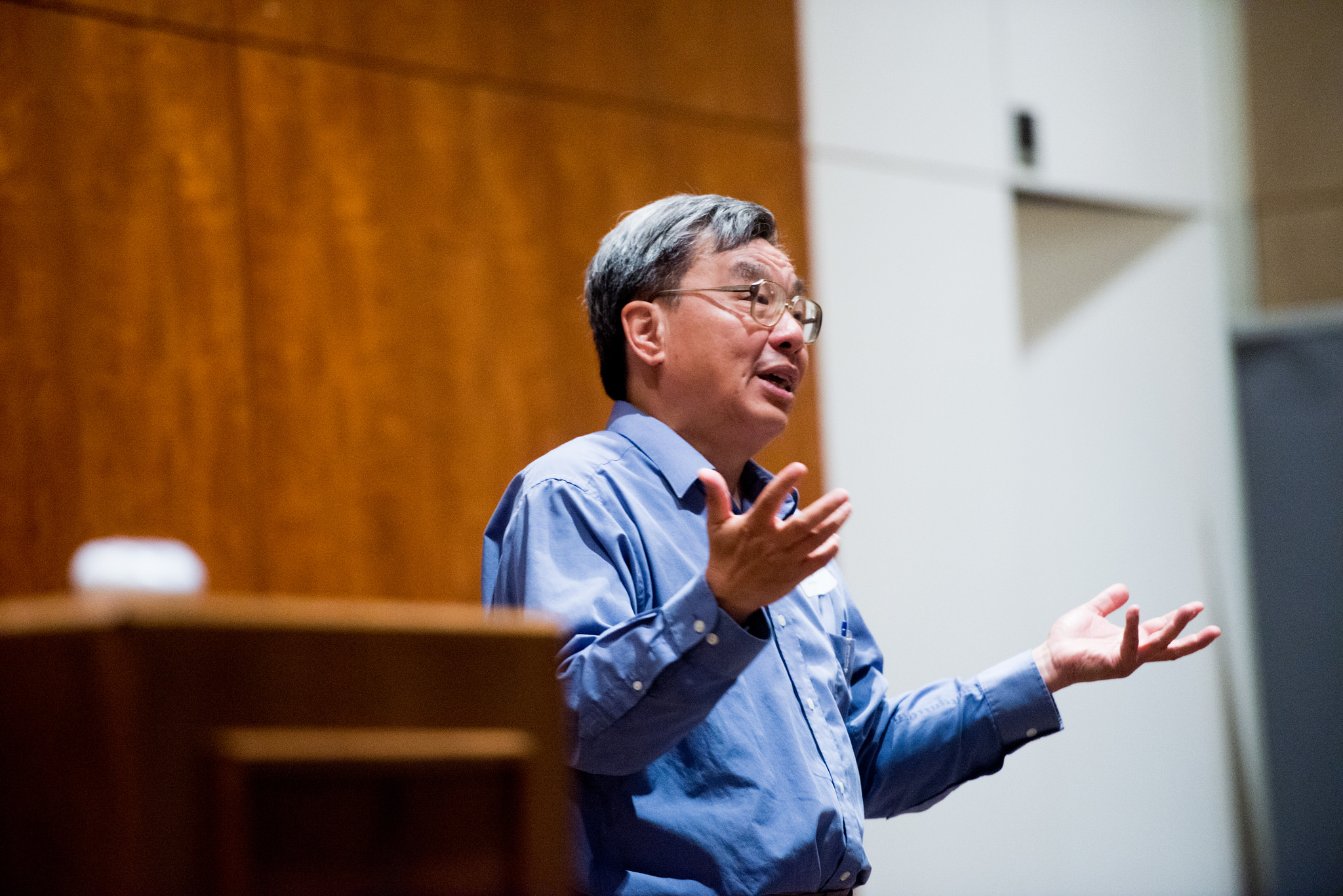 LBJ Professor Pat Wong giving a talk in Bass Lecture Hall during orientation on Aug. 7, 2016