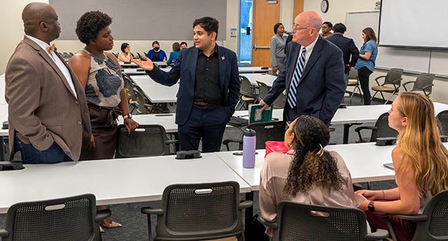 Event attendees discuss topics brought up during the panel portion of the event during a breakout session