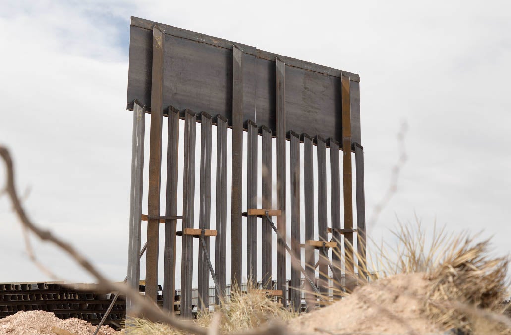 Section of border wall at the construction staging area for the Santa Teresa border wall replacement project — photo by U.S. Customs and Border Patrol