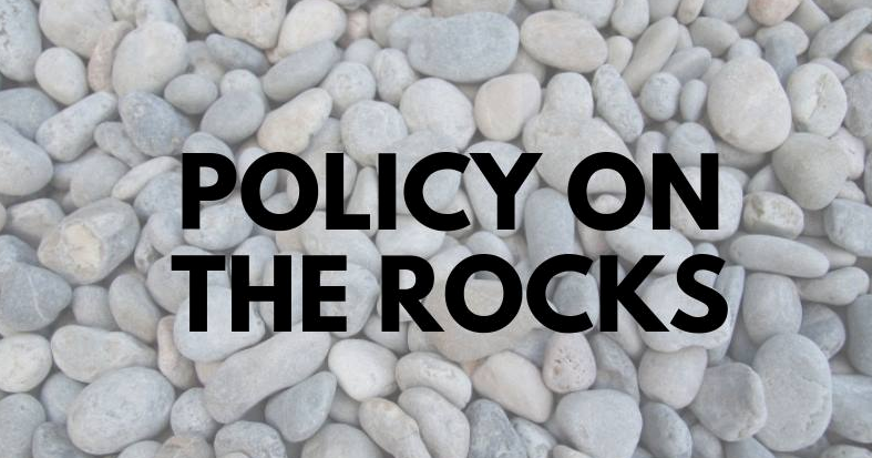 Picture of rocks with text "Policy on the Rocks"