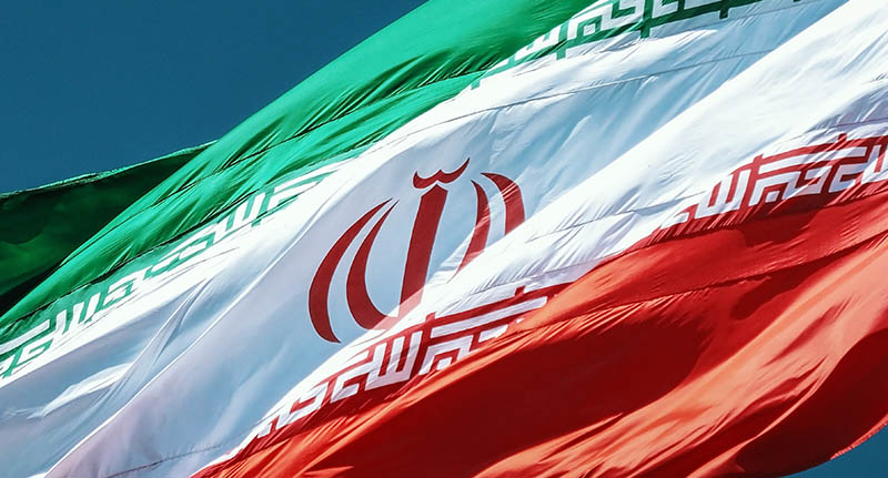 Iranian flag. Credit: Sina Drakhshani, Unsplash