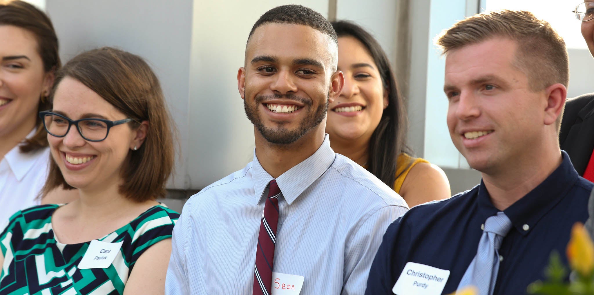 The 2019 class of LBJ DC Fellows is introduced at the Dean's Annual DC Alumni Reception in August. Left to right: Emma Nye, Cara Pavlak, Sean Walker, Christopher Purdy. Back row: Sara Plasencia.