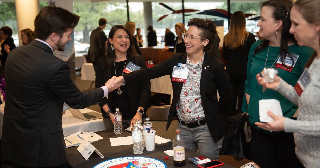 An LBJ student and alumni introduce themselves during the 2019 LBJ School Career Fair