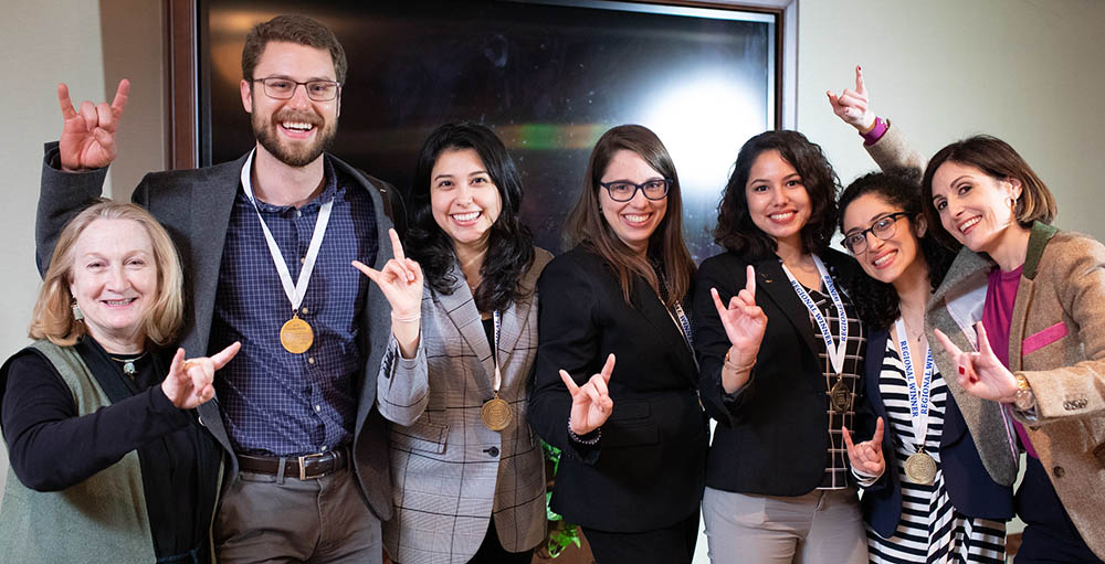 2019 NASPAA Simulation — Team LBJ with Professors Ruth Wasem (far left) and Victoria DeFrancesco Soto (far right)