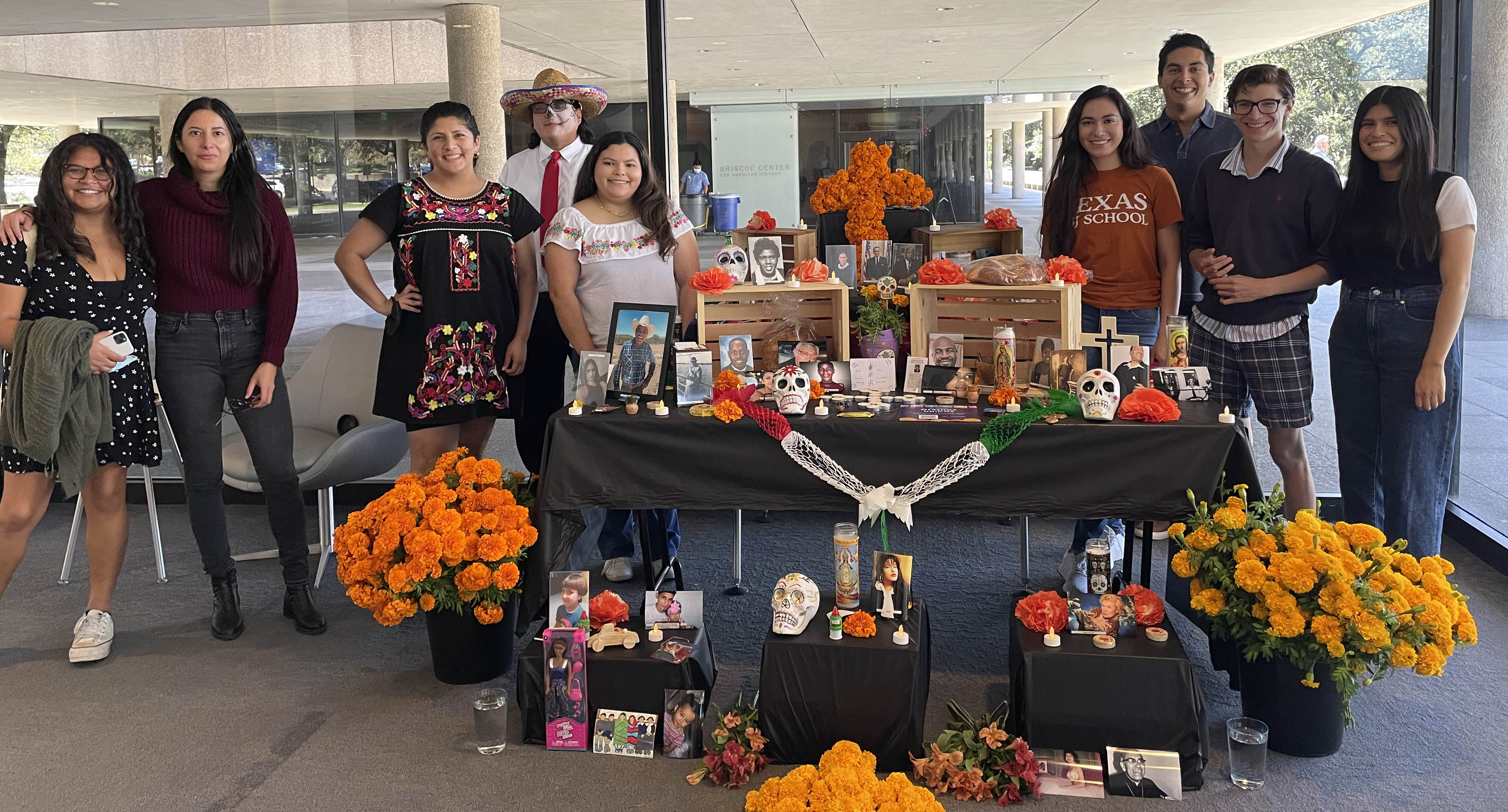 Members of Unidos, LBJ's first Latino student organizaation, with a Dia De Los Muertos altar.