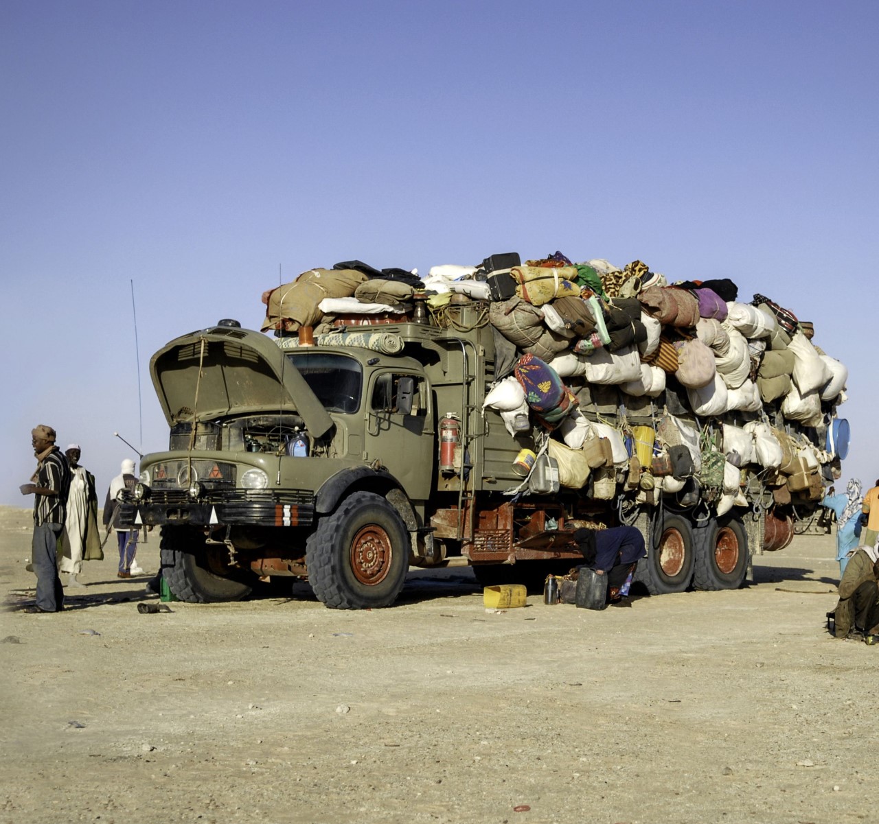 image of truck overloaded with stuff