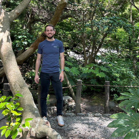 Zander Mintz posing in a park in Japan