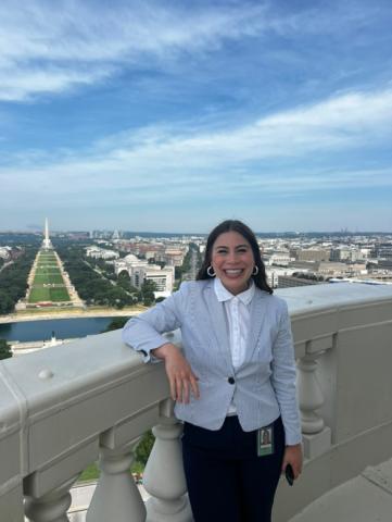 Sara Engelhard on a balcony overlooking DC