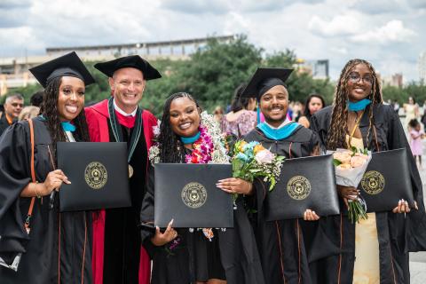 LBJ grad, Kaylah Glaspie, with dean DeShazo and LBJ friends