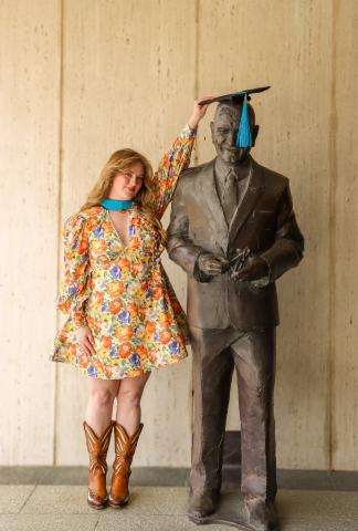 LBJ Student Commencement Speaker Aria Stiefelmaier LBJ Statue