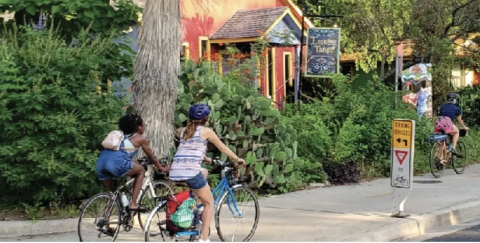 two individuals on bikes