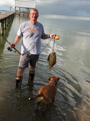 Interim Dean James "Paul" Pope fishing