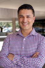 headshot of sergio garcia rios with arms crossed