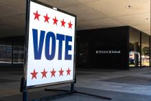 A vote sign outside of the LBJ School