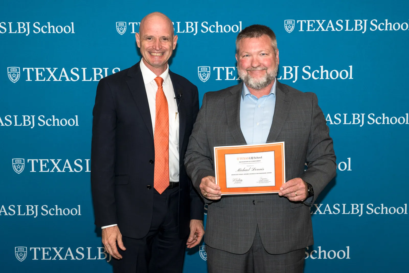 JR DeShazo poses with Professor Michael Dennis during award knights.