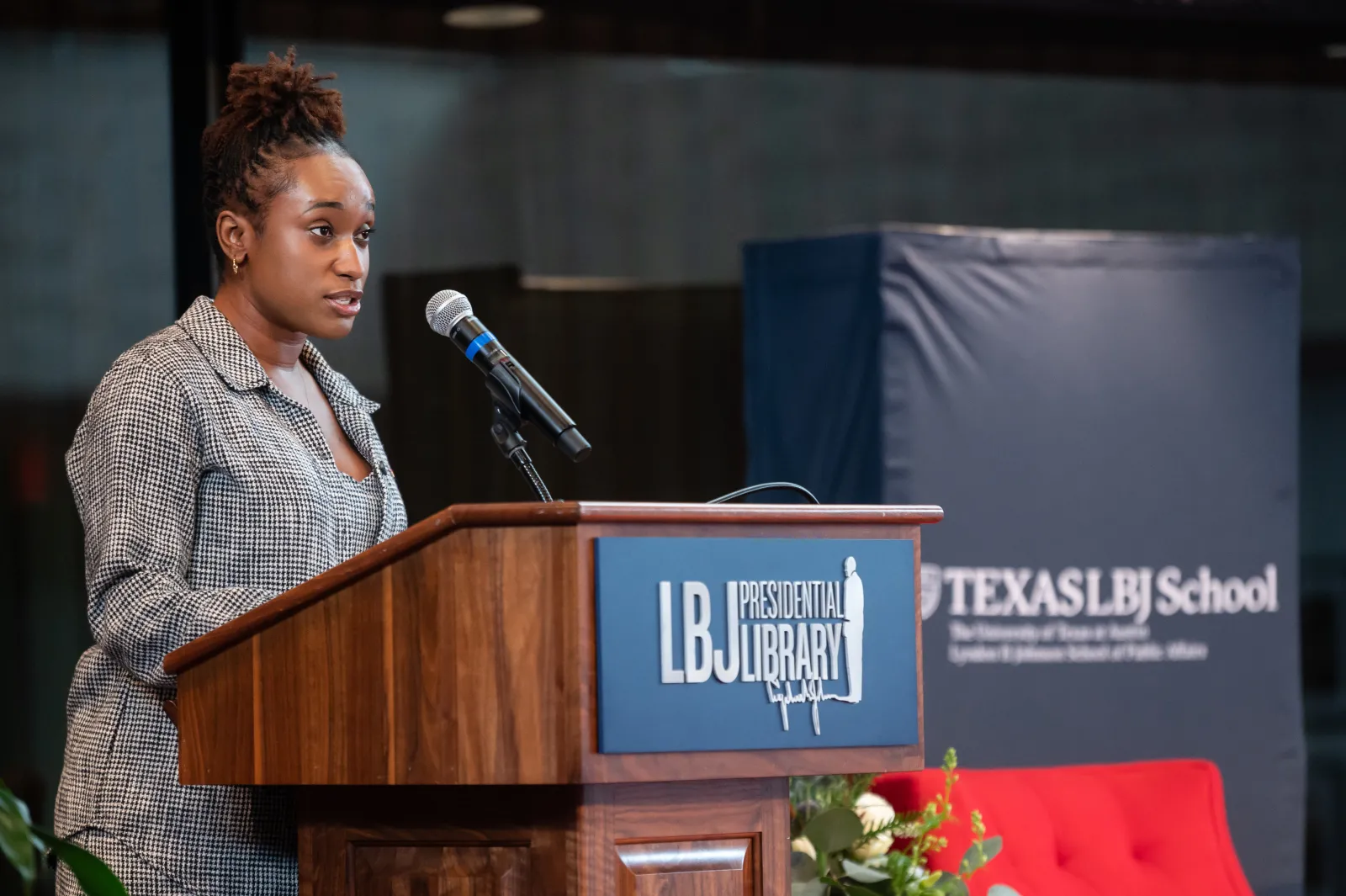Morgan Brown speaking in 2023 as one of the student chairs of the Barbara Jordan National Forum.