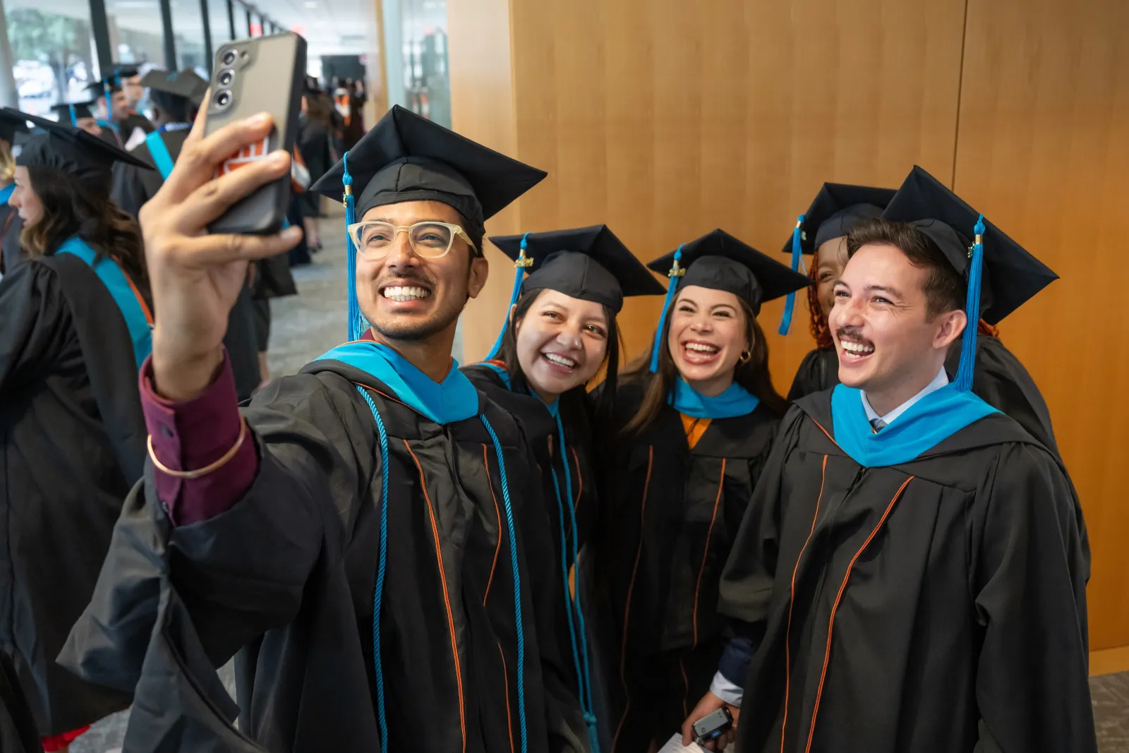 LBJ graduates pose together to commemorate the Class of 2024