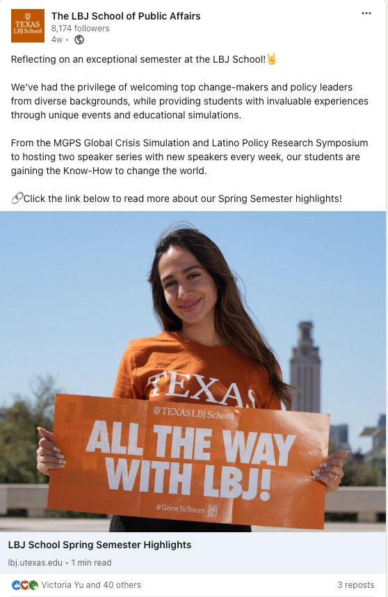 LBJ Student poses with a sign that says "All the way with LBJ"