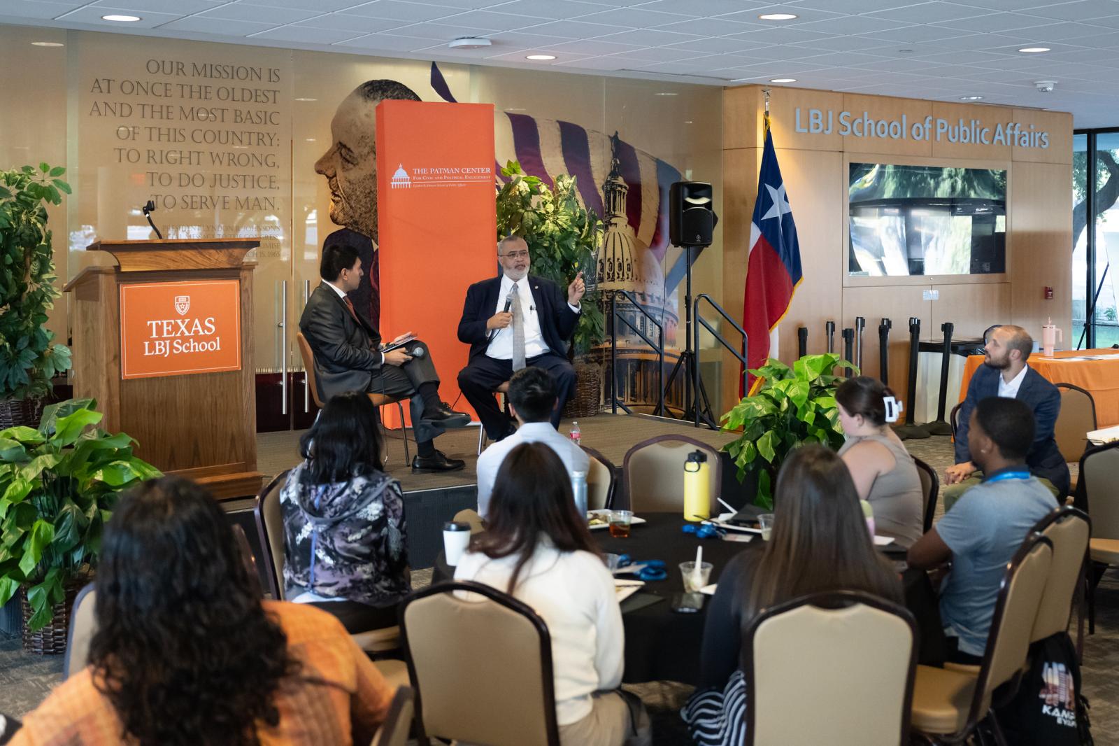 Travis County Commissioner Jeff Travillion speaks to the PPIA students during Public Service Weekend.