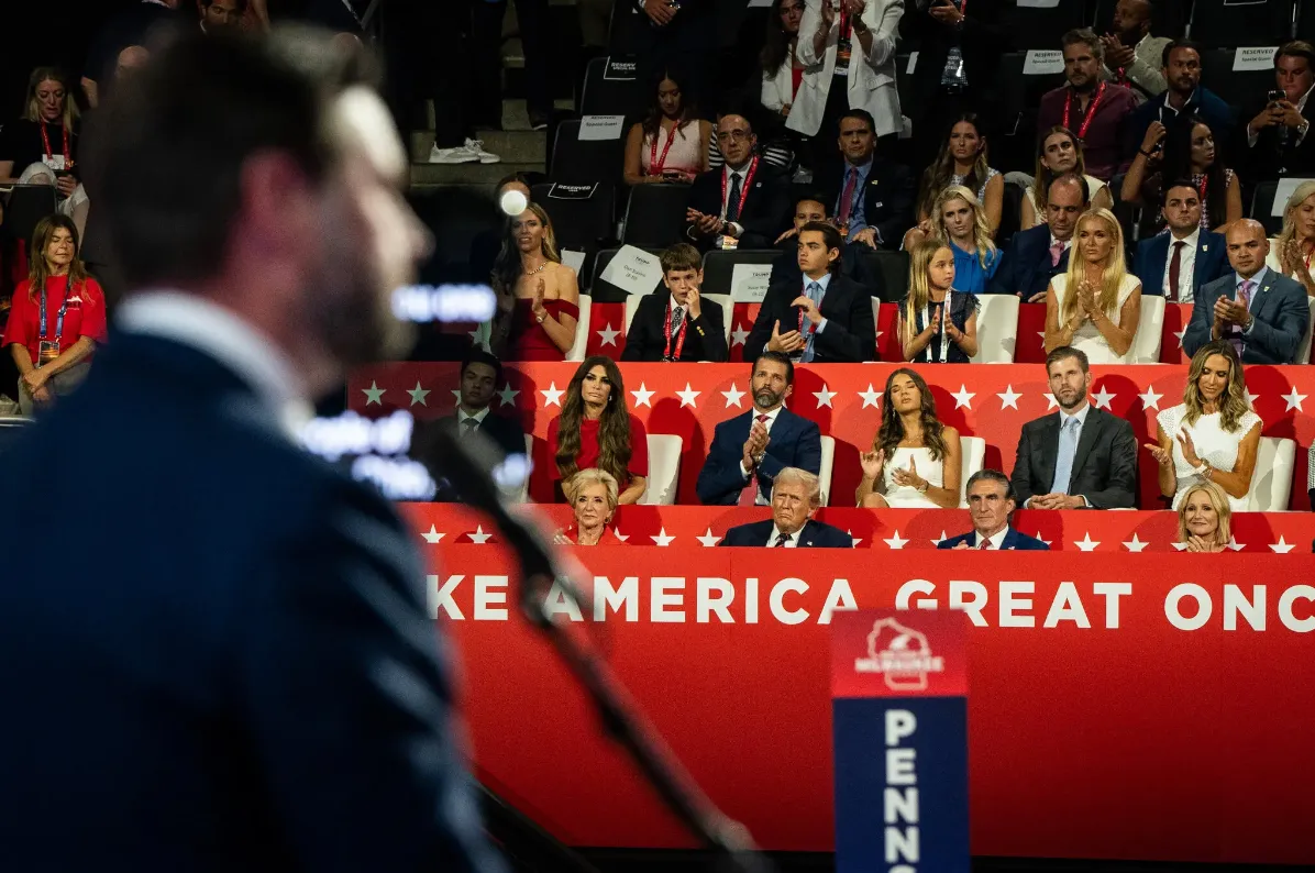 JD Vance in the foreground as Donald Trump and other Republicans look on from the RNC in 2024.