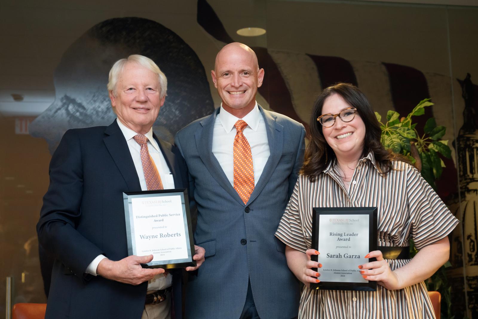 Dean JR DeShazo and the 2024 Outstanding Alumni Award winners Wayne Roberts and Sarah Garza.