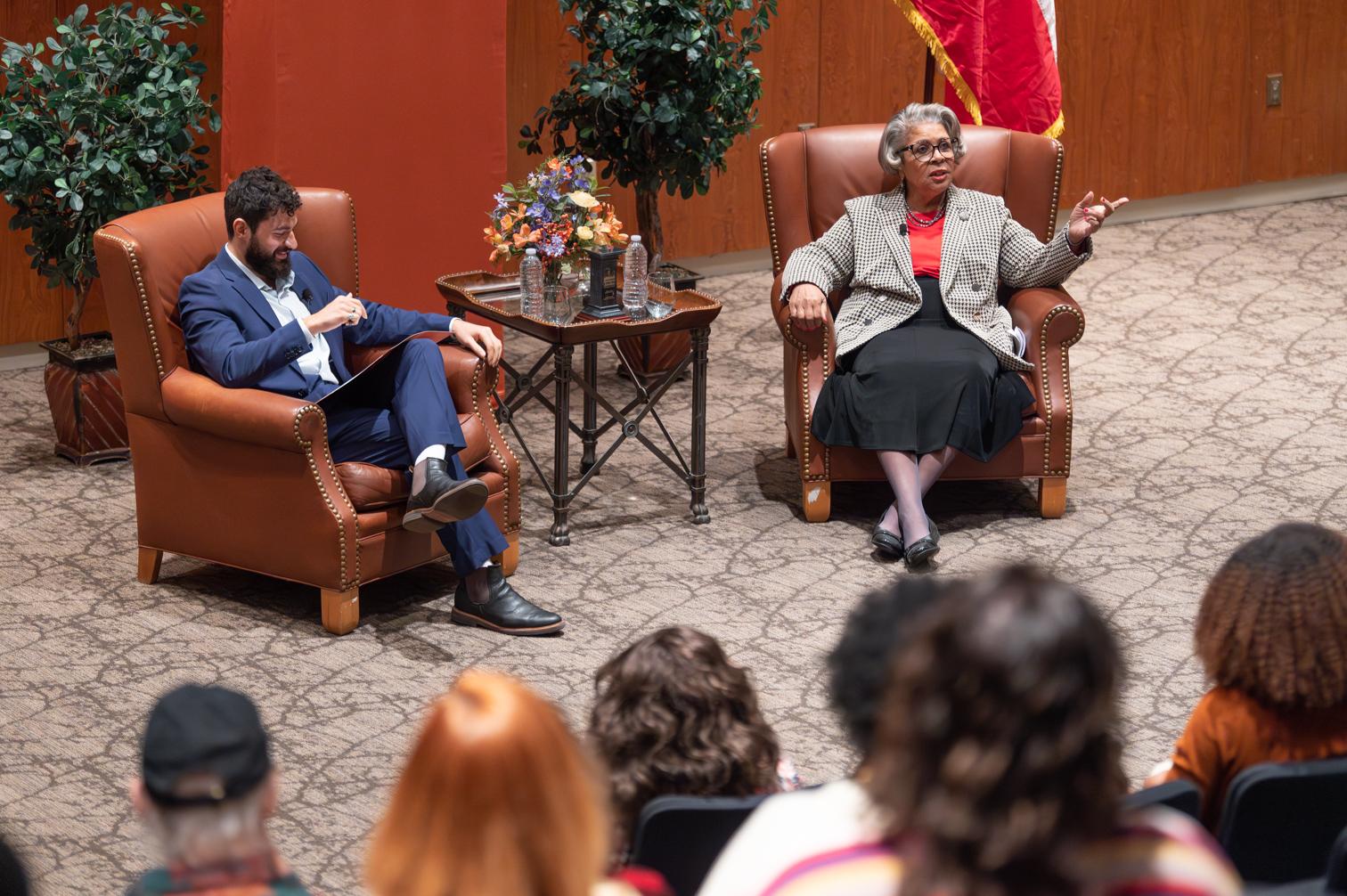 Senfronia Thompson keynote wide Ali Altahafi speaking with Senfronia Thompson in front of a crowd