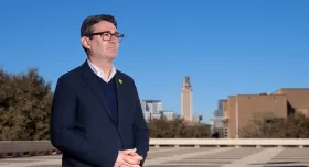 Andy Burnham posed in front of the UT Tower