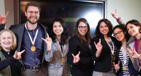 Group of LBJ students wearing medals as regional winners at the 2019 NASPAA-Batten Student Simulation Competition.