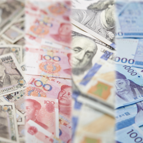 Image shows the currency of Japan, China, the United States, and South Korea.