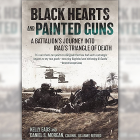 The image shows the book cover of "Black Hearts and Painted Guns" by Kelly Eads and Dan Morgan