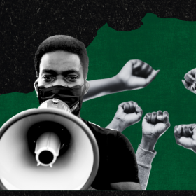 Image of a young man holding a bullhorn, with a green and black background