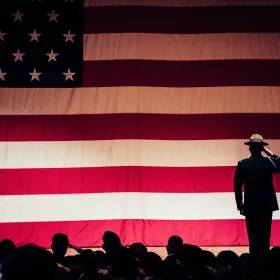 Man saluting flag