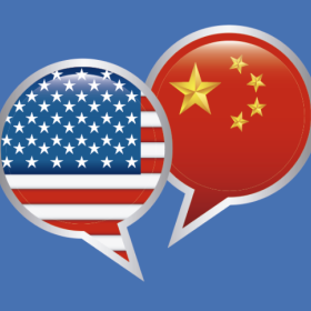 On the Ground in China Square Image with US and China Flags