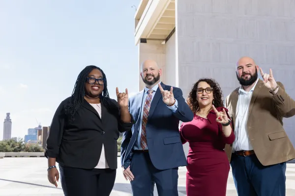 Four EMPL students outside LBJ Library