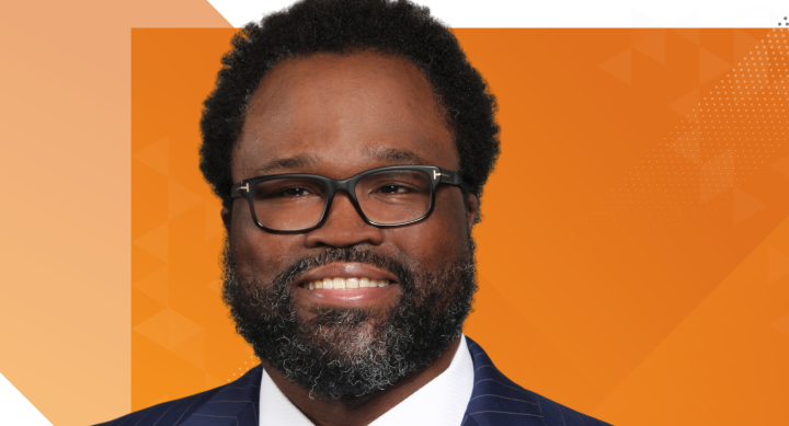 Headshot of Irvin Ashford LBJ Alumnus against burnt orange background