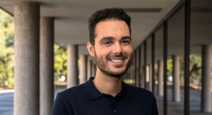 Gabriel Kornas, an MPAff student and Rangel Fellow from Seattle, Wash. poses in front of the LBJ School.