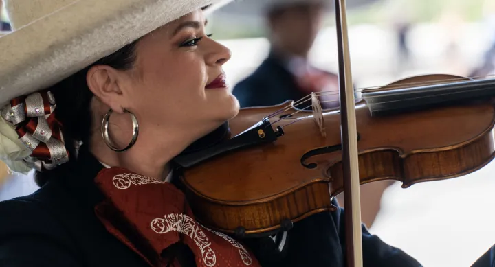 A mariachi musician performs at the LBJ Latino Policy Research Symposium.