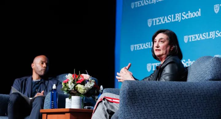 Marta Tellado sits alongside Dr. Peniel Joseph for an LBJ School event.